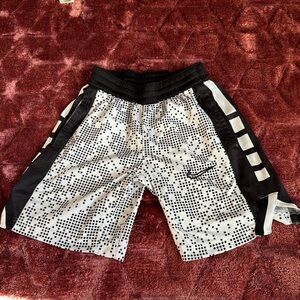 Nike dri-fit basketball shorts. Size S. Black and white print. Side pockets.